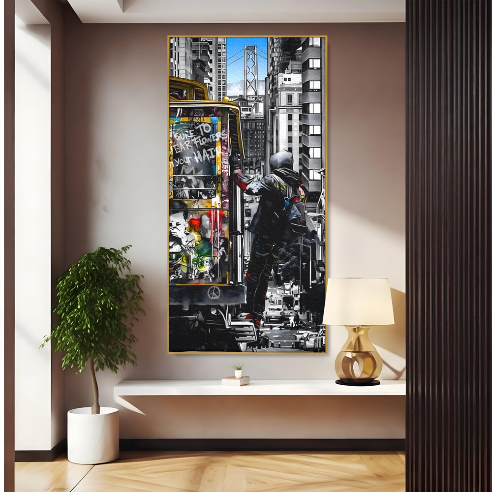 Tablou canvas cu ilustratie urbana cu un tramvai si un calator, in rama de aluminiu auriu